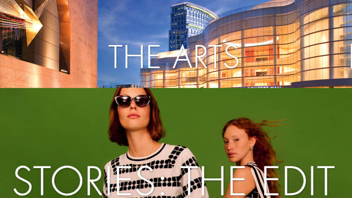 A wide view of South Coast Plaza showcasing elegant architecture, luxury storefronts, and visitors enjoying a premium shopping experience.